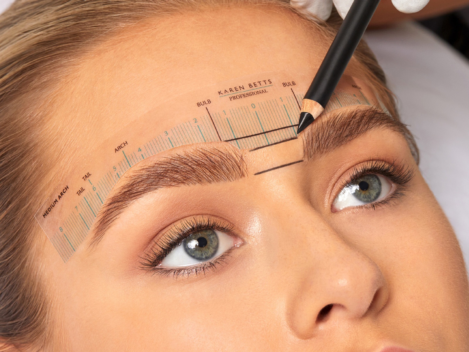 Professional KB Pro eyebrow mapping before microblading